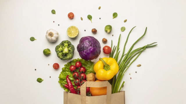 top-view-assortment-vegetables-paper-bag